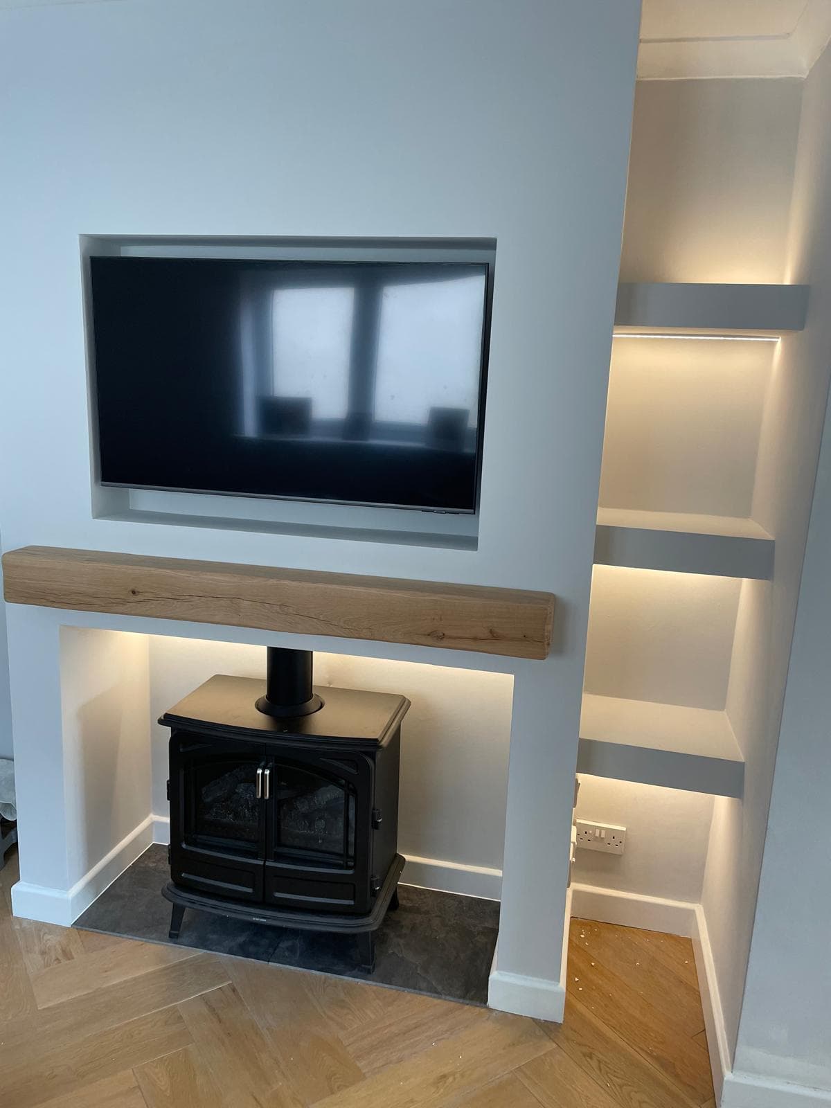 Built-in alcove shelving in a living room